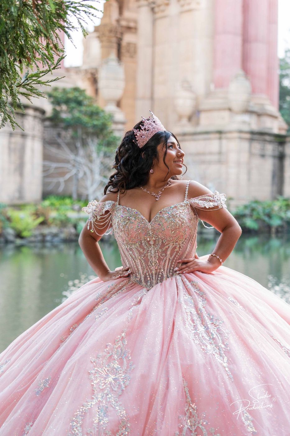 Quinceañera portrait beneath the Palace of Fine Arts columns