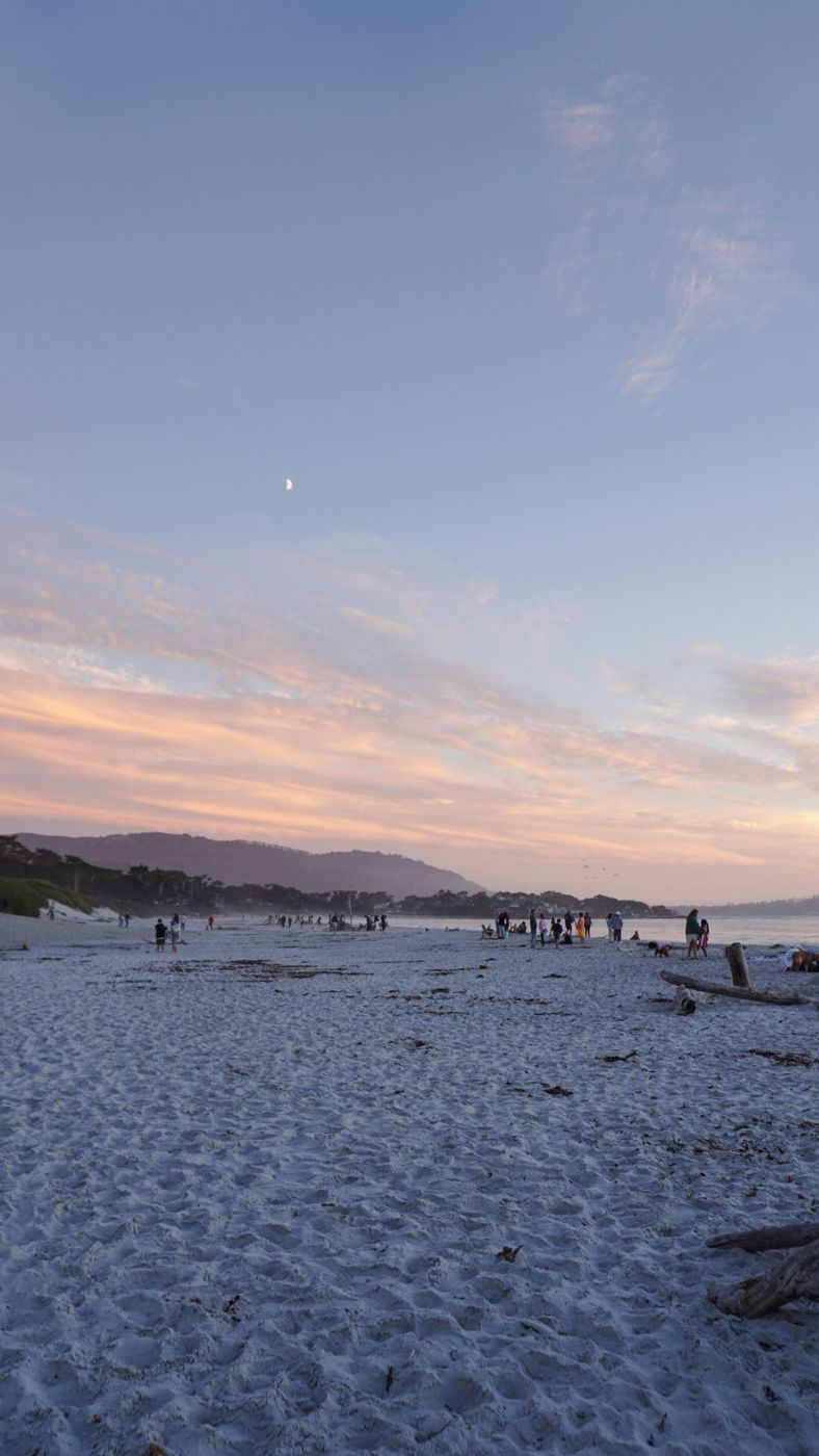 Pastel sunset colors over the water at Carmel Beach