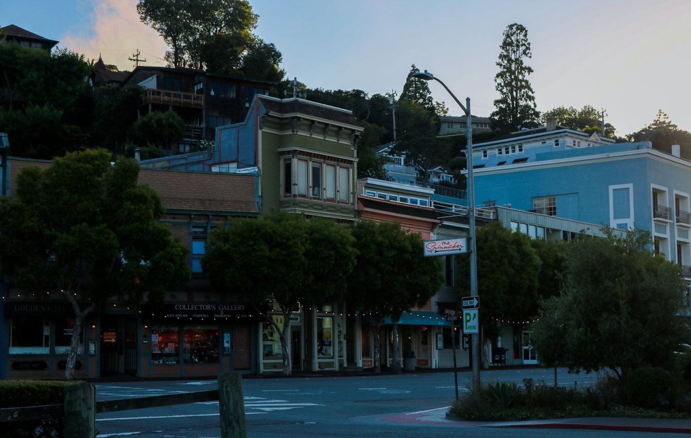 Colorful storefronts on a Sausalito street corner